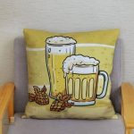 Housse de coussin avec motif bière traditionnel