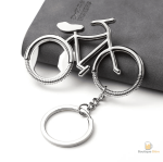 Porte-clé décapsuleur en forme de vélo pratique et fonctionnel